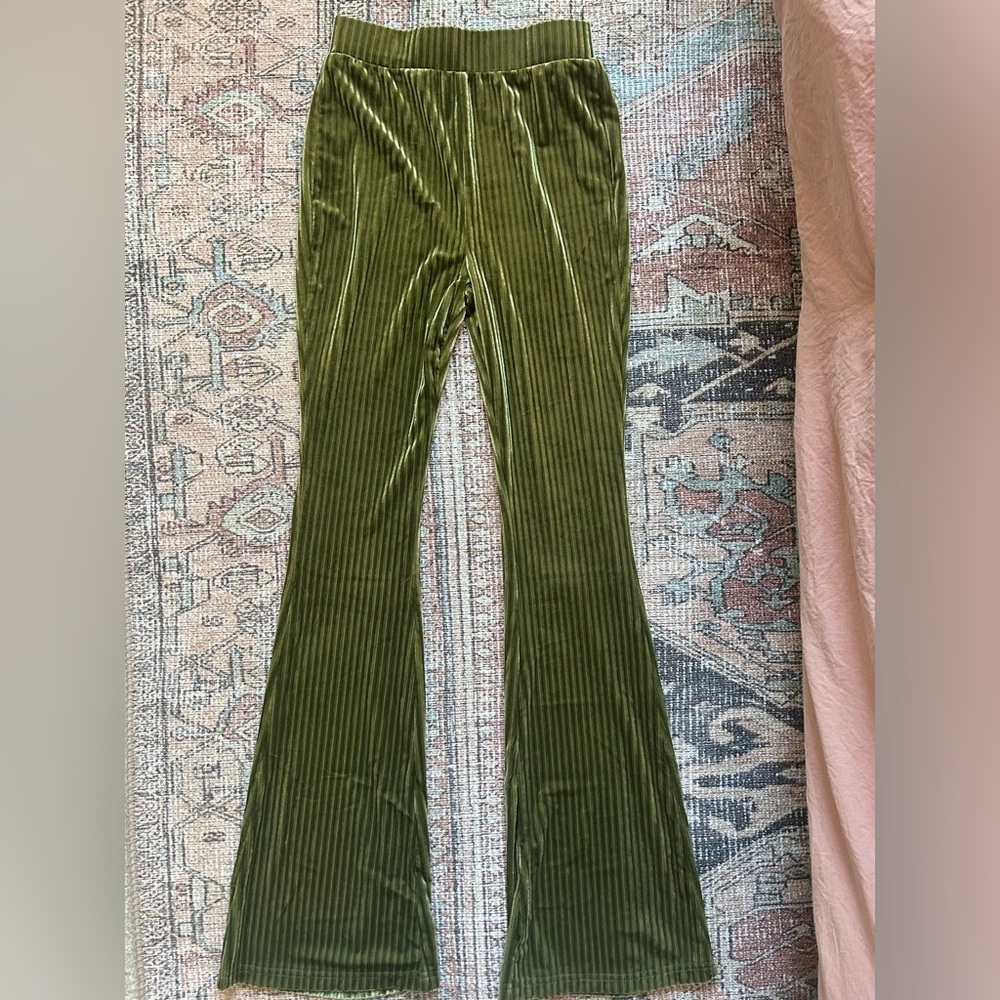 Green velvet flare pants